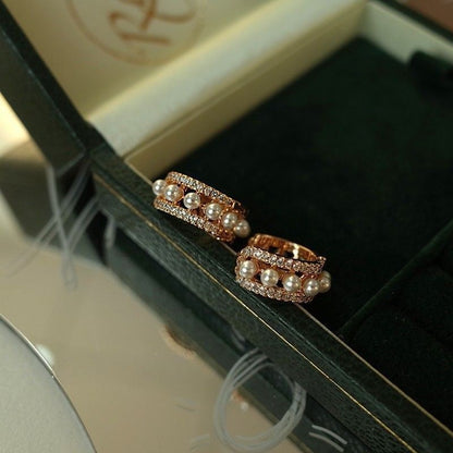 A Pair Round Gold Pearl Earrings